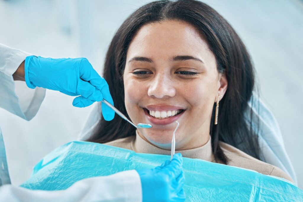 adult woman dental check up procedure at dentist